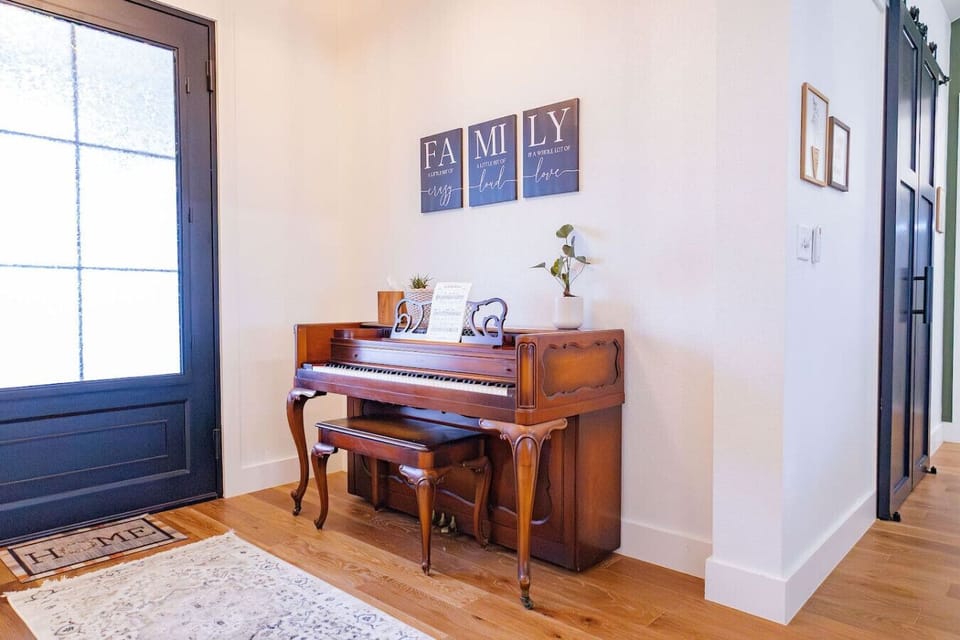 Tuned upright Piano.