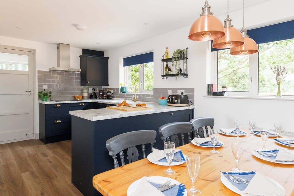 Cook up a feast in the fully equipped modern kitchen with countryside views.