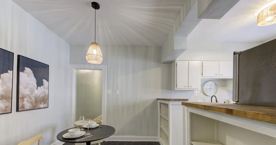 Dine in style with a cozy setup, warm lighting, and a welcoming ambiance—great for casual meals or a quiet workspace.