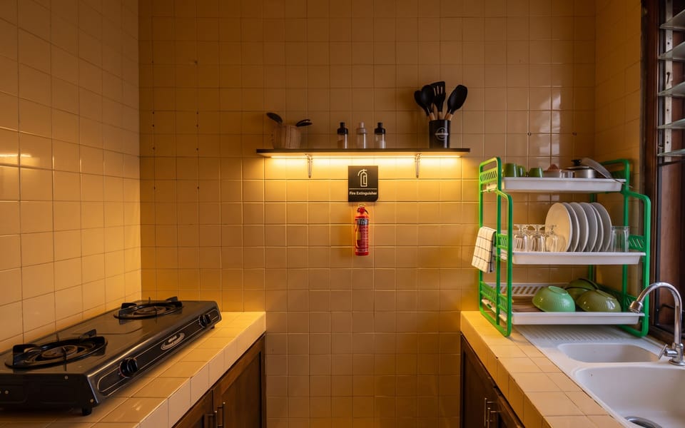 Apartment, Pool View | Private kitchen | Shared fridge, microwave, stovetop, dishwasher