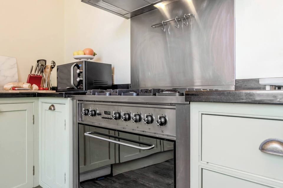 Enjoy the convenience of a fully equipped kitchen, perfect for preparing meals during your stay.