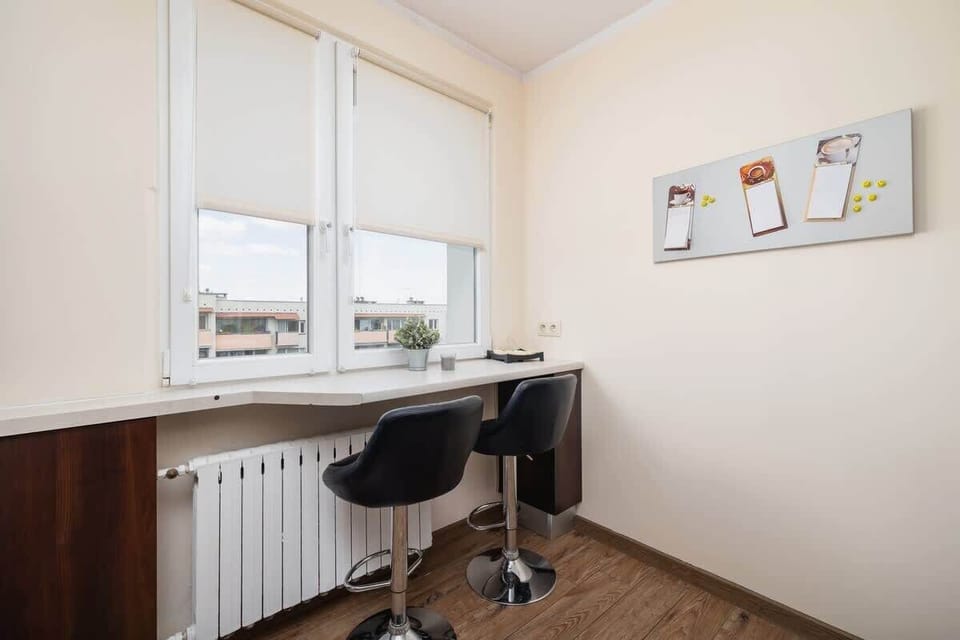 A comfortable place to eat by the window.