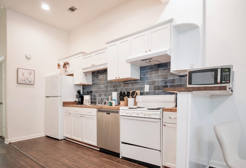 Microwave, oven, stove, coffee maker, refrigerator and cooking materials
