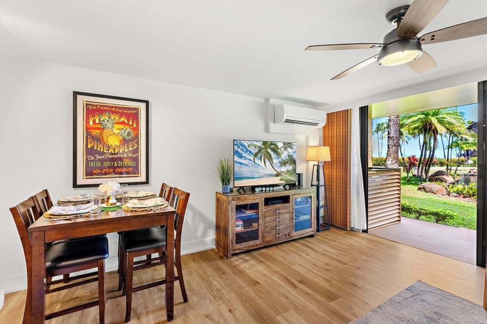 Your dining area flows effortlessly into the living space, making it easy to share breakfast before heading out to the beach.
