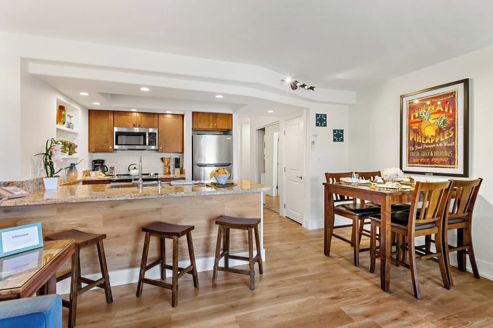 Your open-concept abode keeps everyone connected, whether they’re grabbing a snack, getting ready to head out, or napping on the lanai.