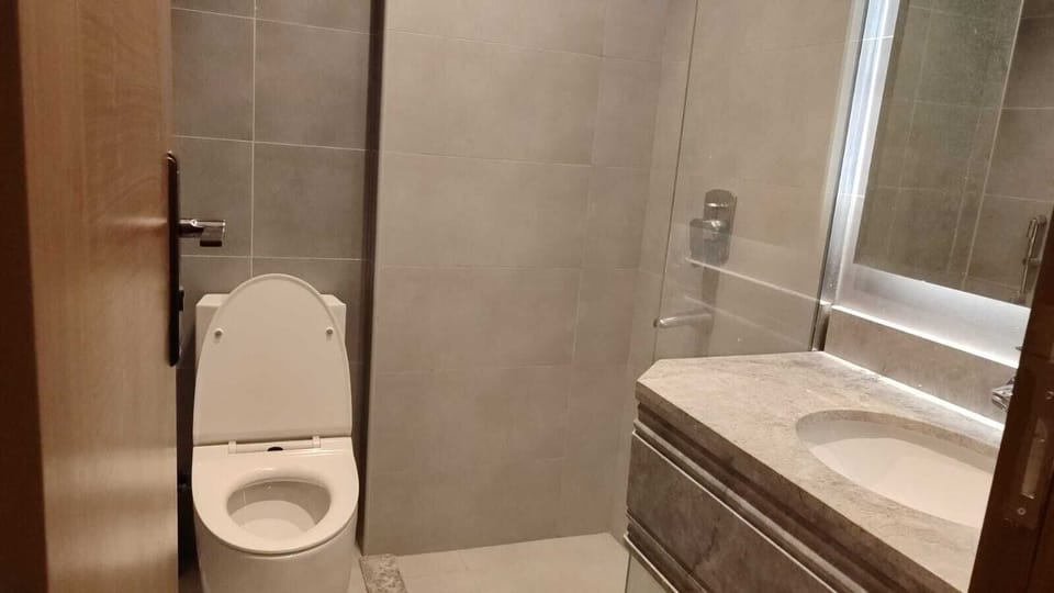 Separate tub and shower, hair dryer, bathrobes, slippers