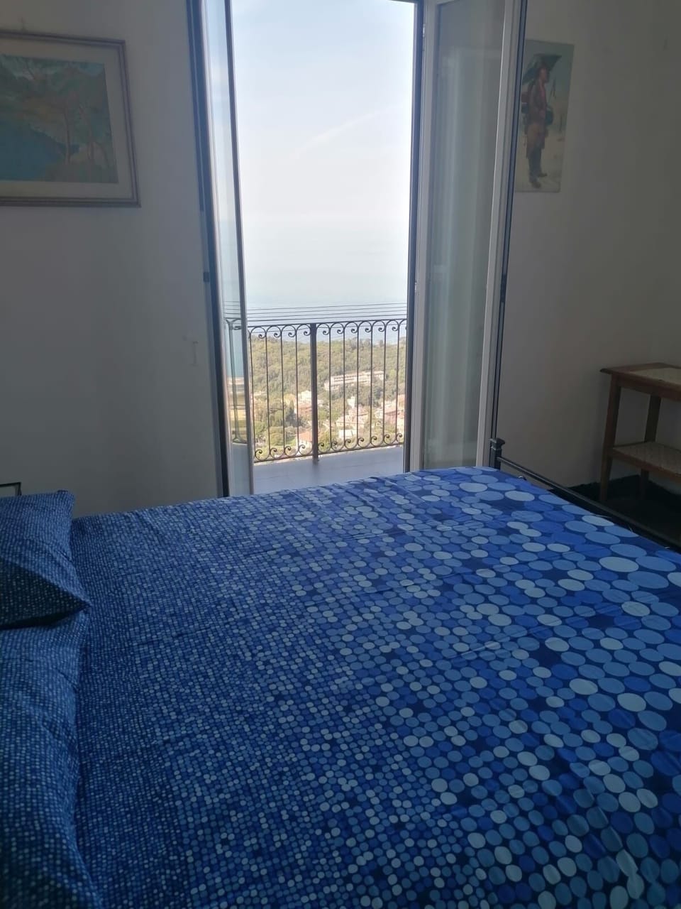 Master bedroom with balcony access
