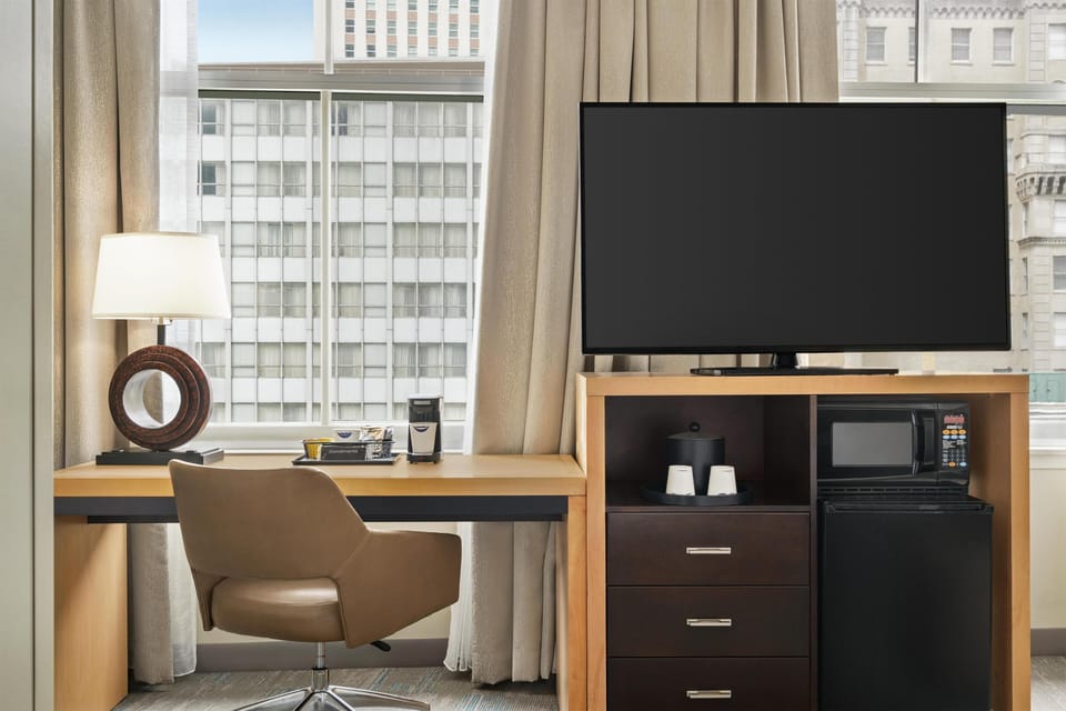 Room, 1 King Bed with Sofa bed | In-room safe, desk, laptop workspace, iron/ironing board