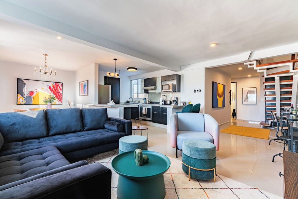 Deluxe Apartment, 5 Bedrooms | Living area | TV