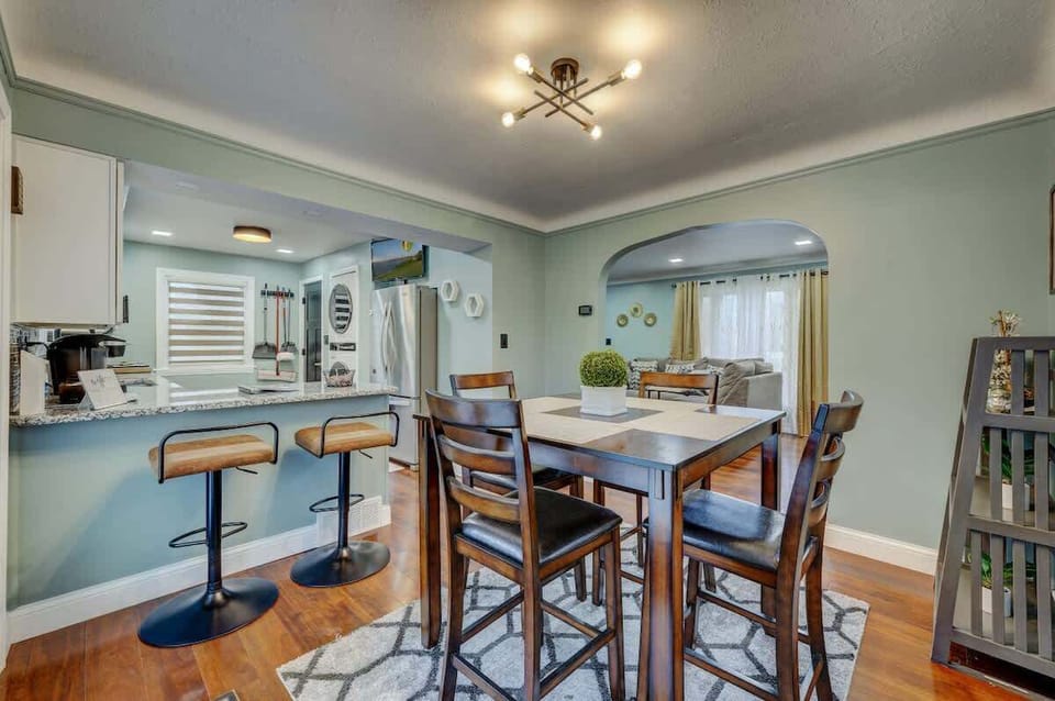 Open dining space w/ bar seating & easy flow into the kitchen for shared meals