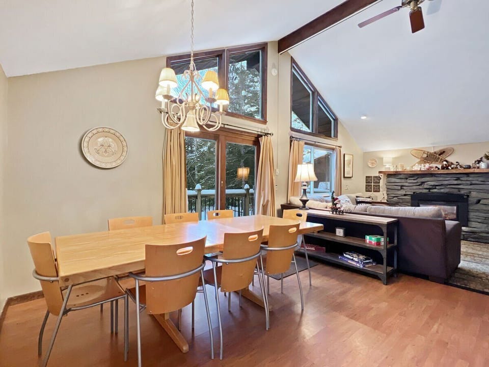 Large dining table beside the great room—perfect for group meals and game nights.