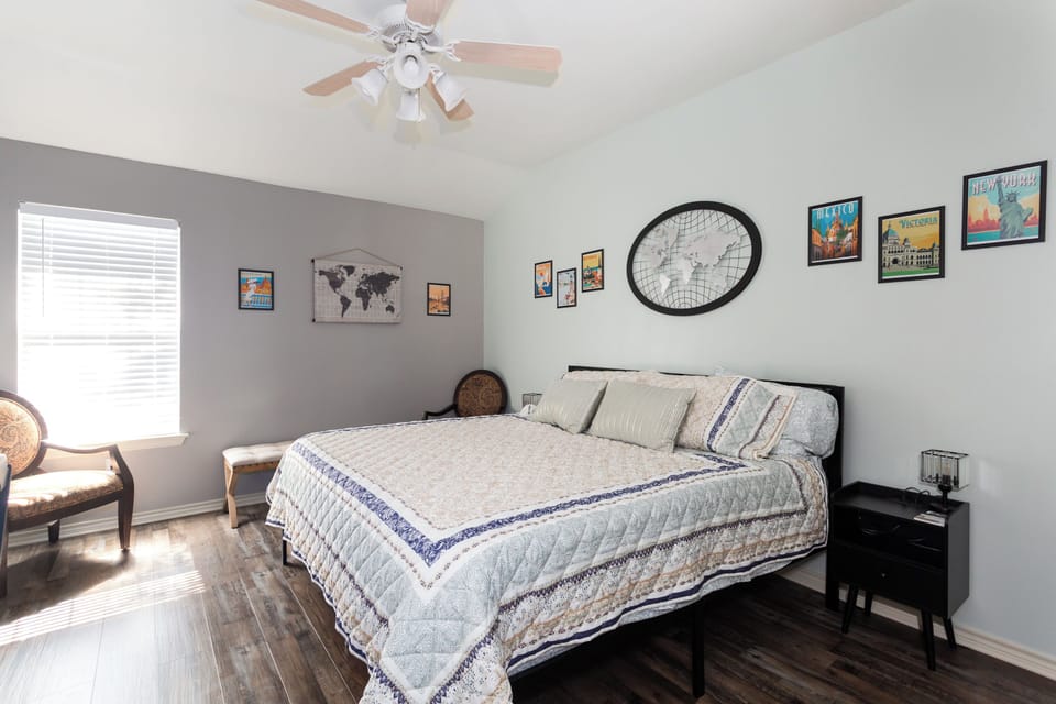 Master bedroom with King bed - twin roll away bed in closet