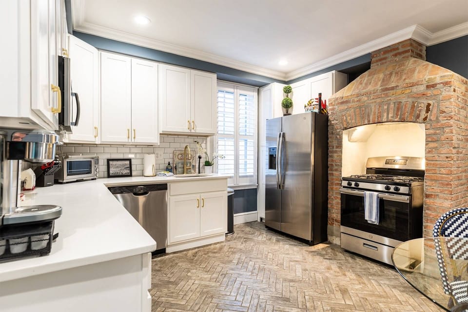 Continue through the apartment to the fully-renovated eat-in kitchen complete with all upgraded appliances and finishes.