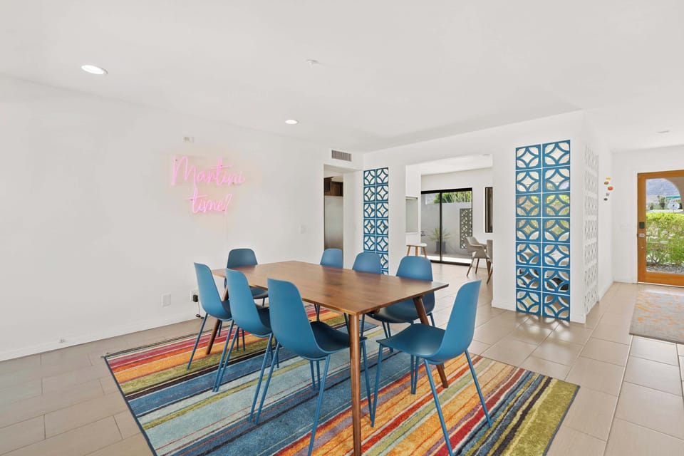 Dining area with table and seating for 8