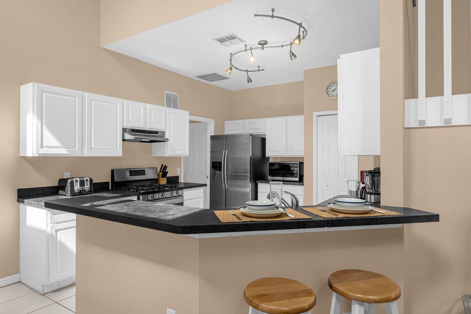 Additional seating at the kitchen island bar