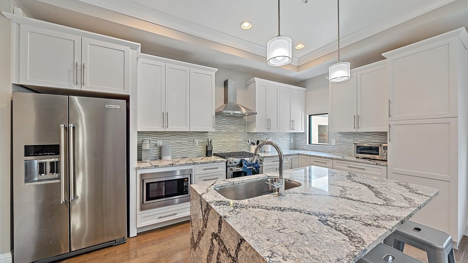 Townhome, 2 Bedrooms | Private kitchen | Fridge, oven, coffee/tea maker, toaster