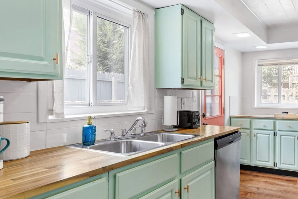 The kitchen area has a window for ventilation
