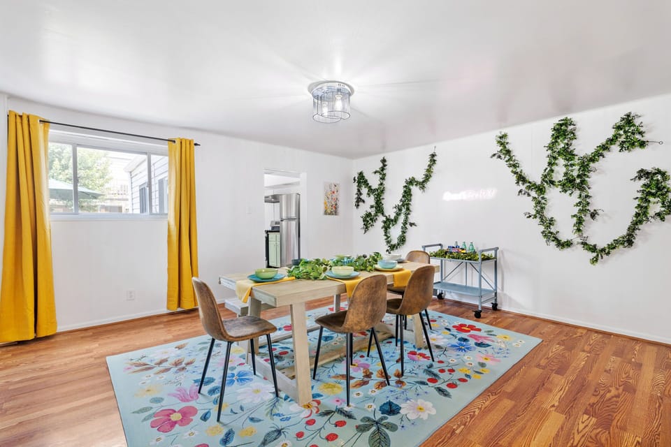 Dining area with hardwood flooring and elegant interior