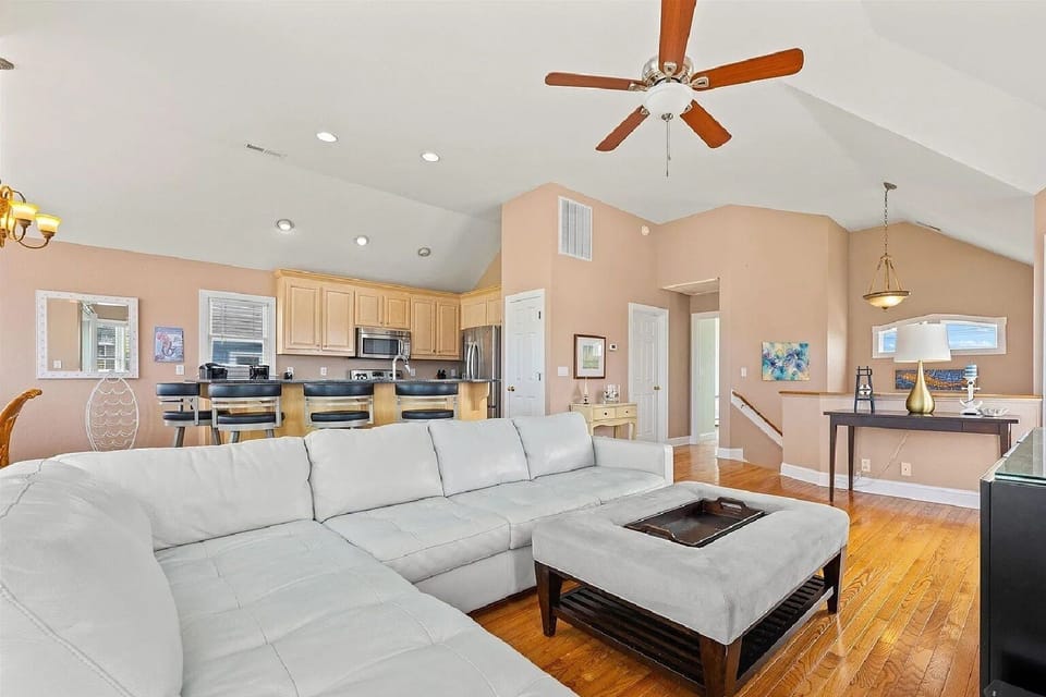Relax in Style in High Ceiling Living Room on Third Level