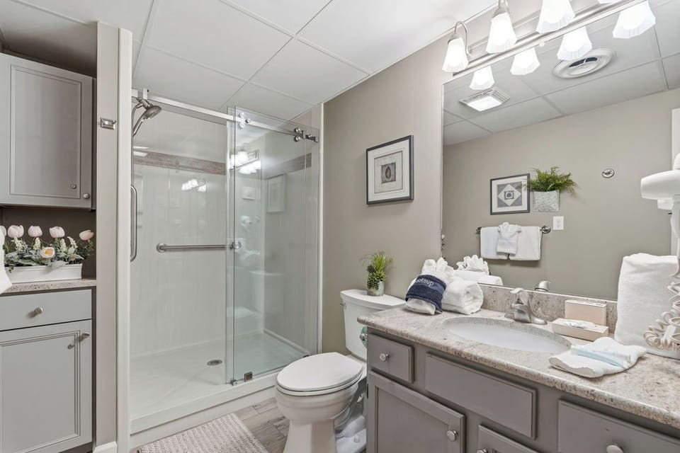 Full Bathroom with walk in shower, Towels Provided