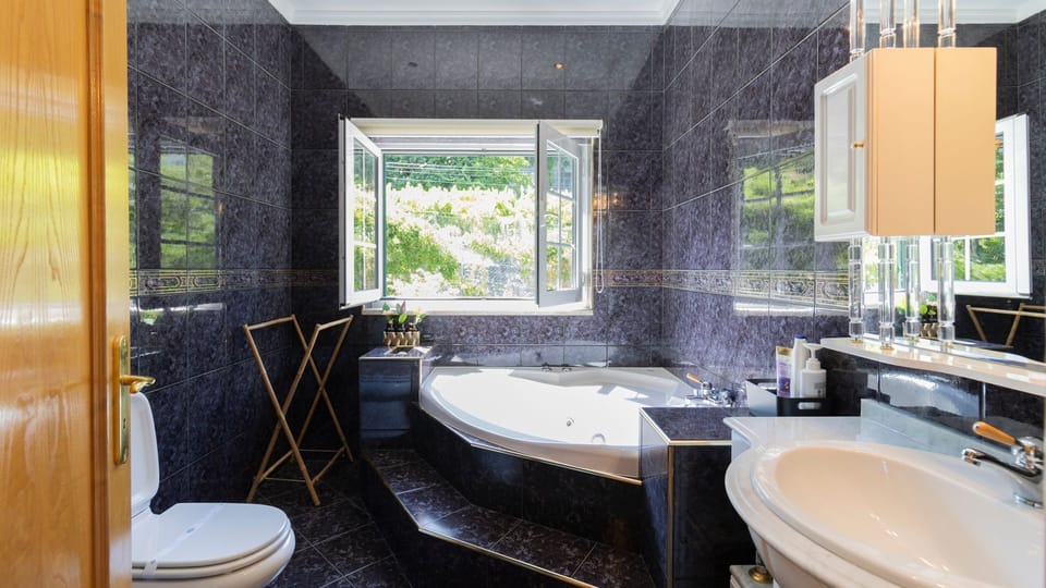 Luxurious bathroom with a bathtub and scenic views—your perfect space to relax and recharge. #LuxuryBathroom #Relaxation