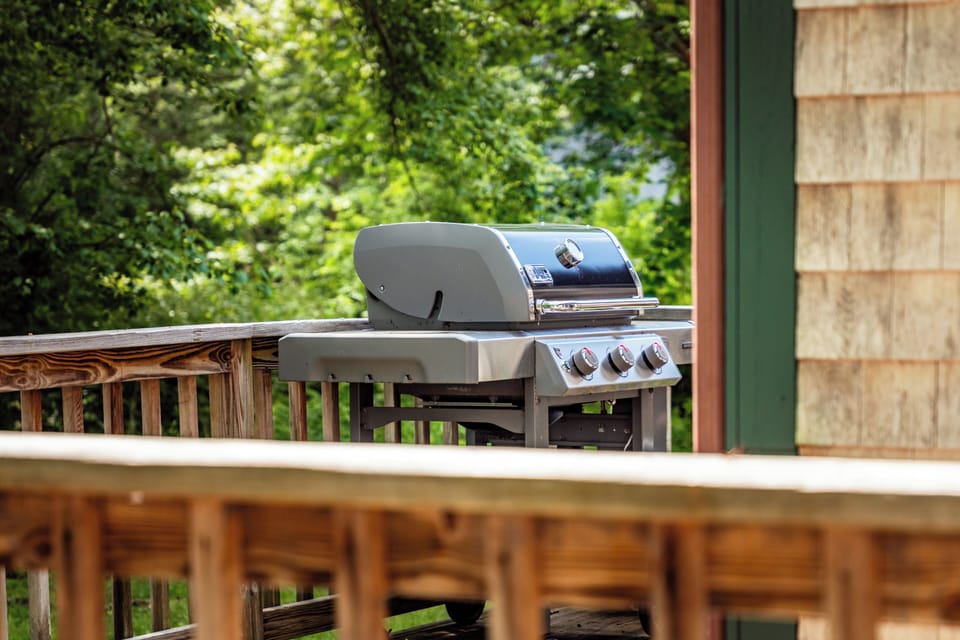 Back porch with propane grill. 