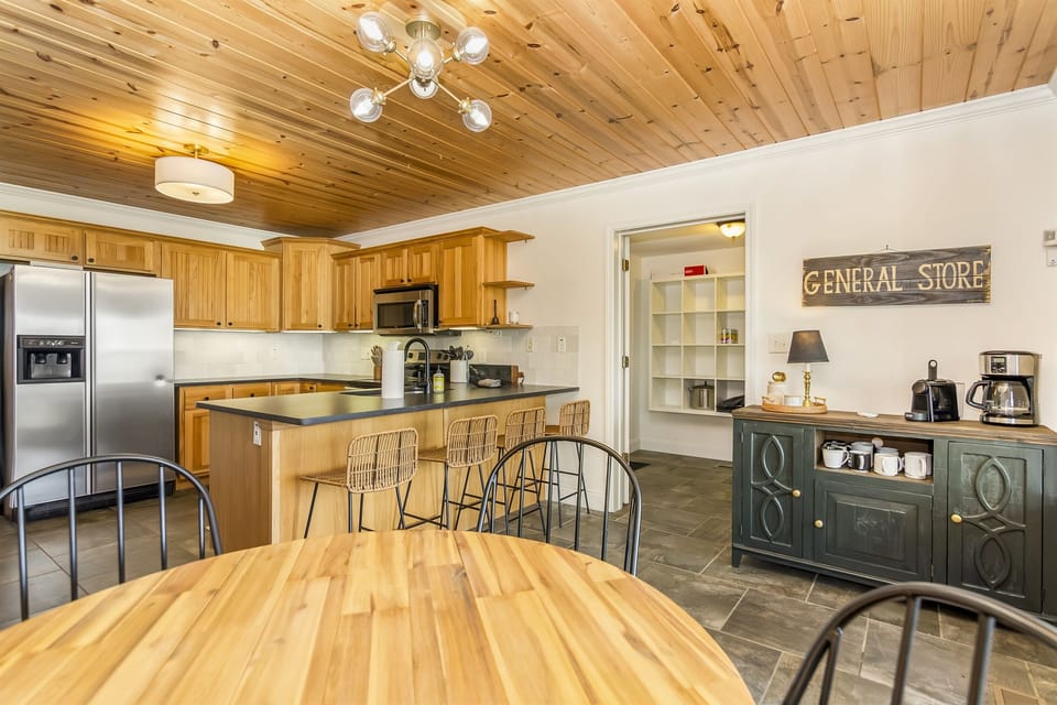 Kitchen table with four chairs and 4 bar stools 