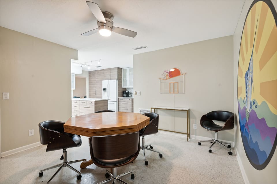 Indoors, Ceiling Fan, Chair, Furniture, Table