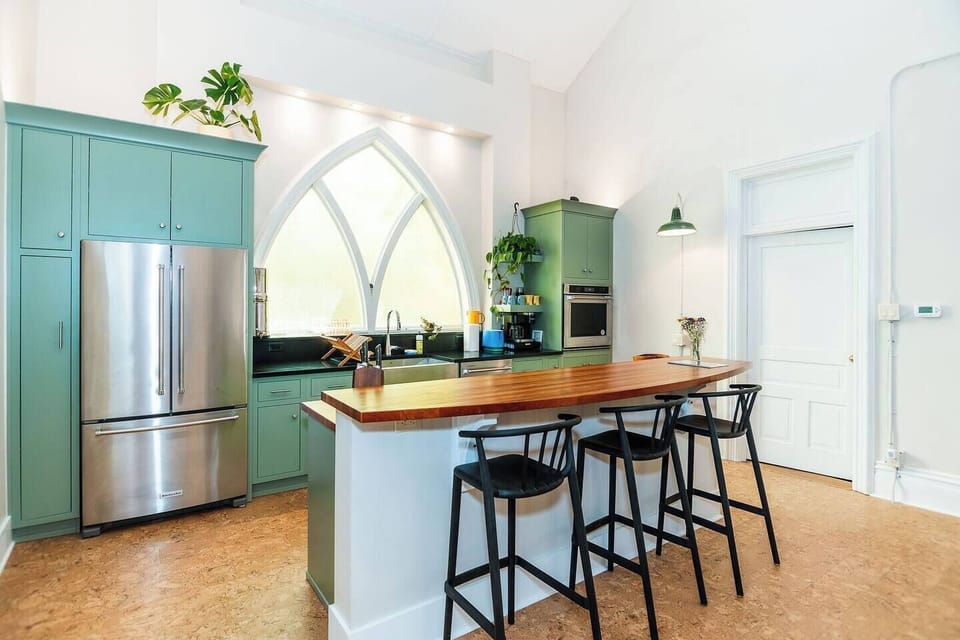 Modern kitchen converted from the original chancel.