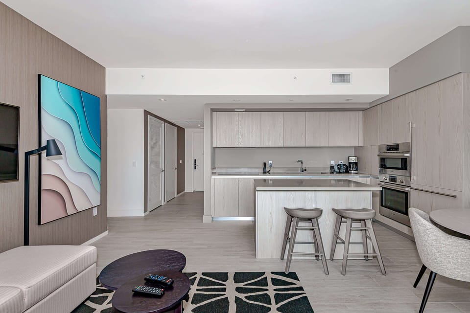 Luxury Apartment, 3 Bedrooms, Balcony, City View | Living area | 50-inch Smart TV with cable channels
