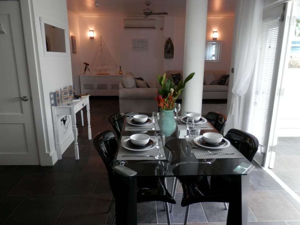 Dining area leading into living room