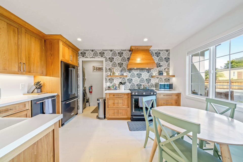 The serene, eat-in kitchen is spacious & offers all the comforts of home