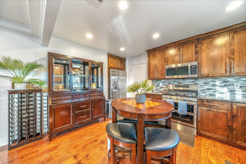 Full kitchen with stainless steel appliances