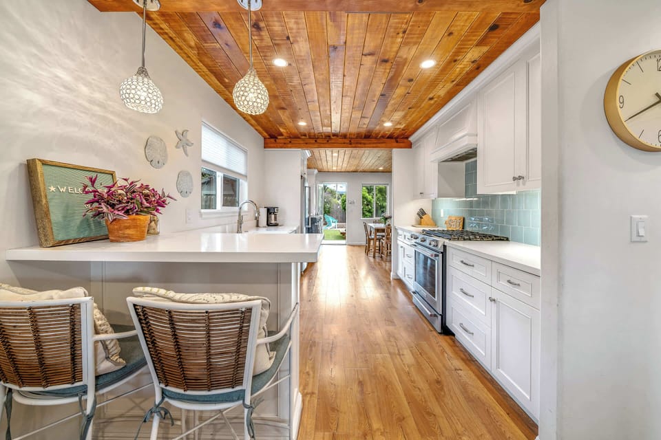 Sip morning coffee or grab a bite at the kitchen counter, with seating for 2