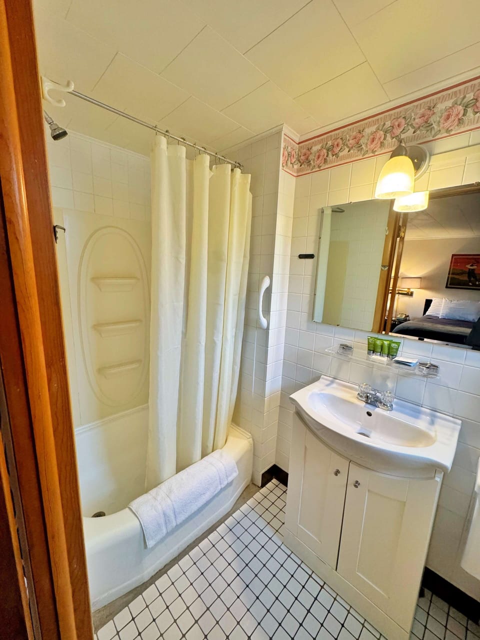 Room, 2 Double Beds, Ground Floor | Bathroom | Combined shower/tub, hair dryer, towels, soap