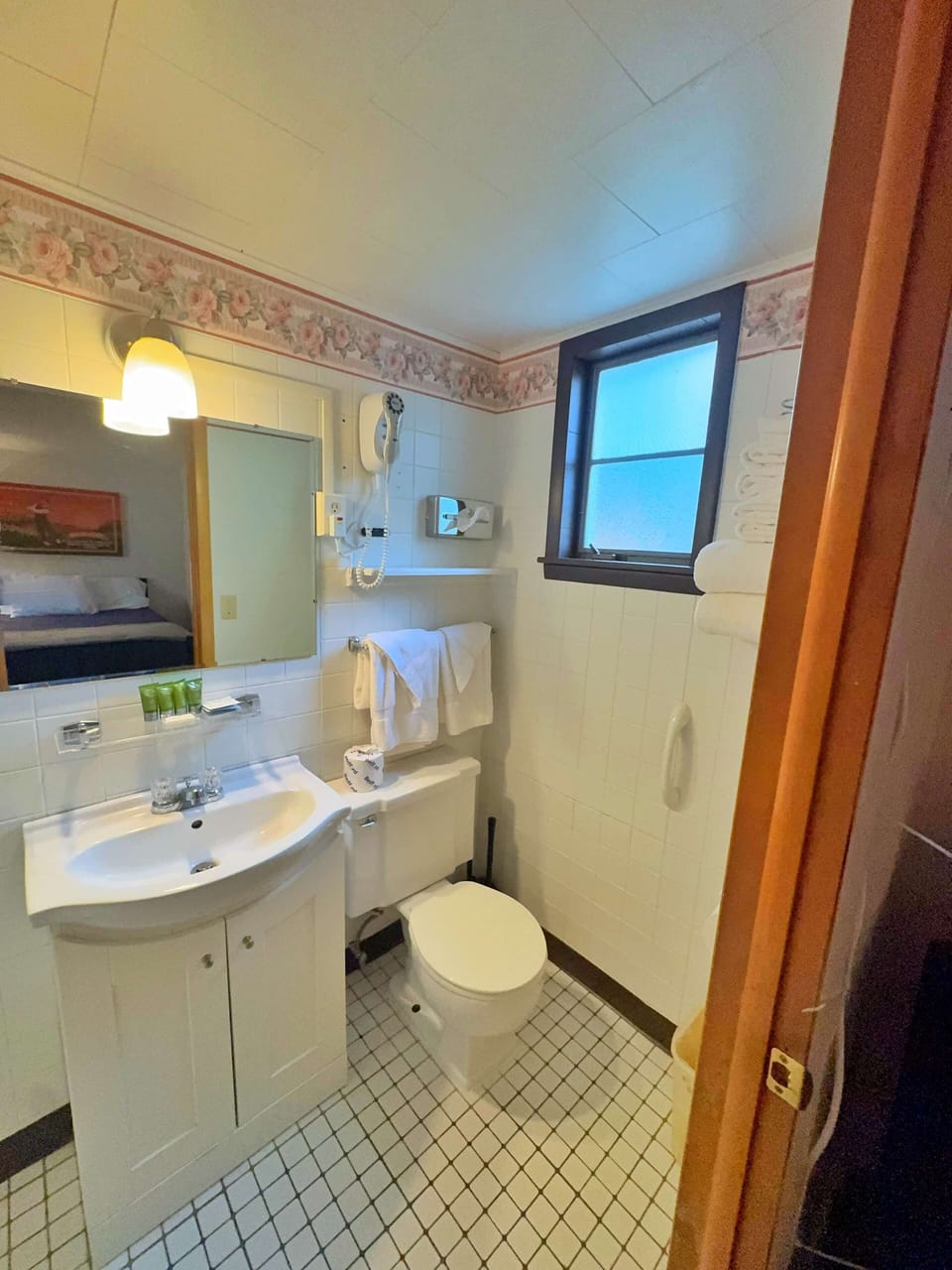 Room, 2 Double Beds, Ground Floor | Bathroom | Combined shower/tub, hair dryer, towels, soap