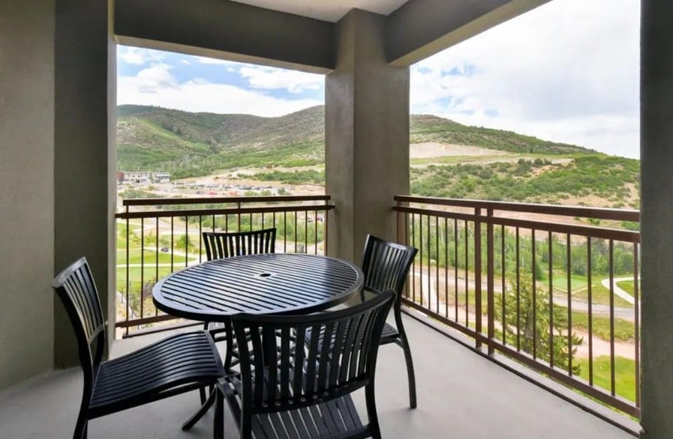 Private balcony with breathtaking views, perfect for morning coffee.