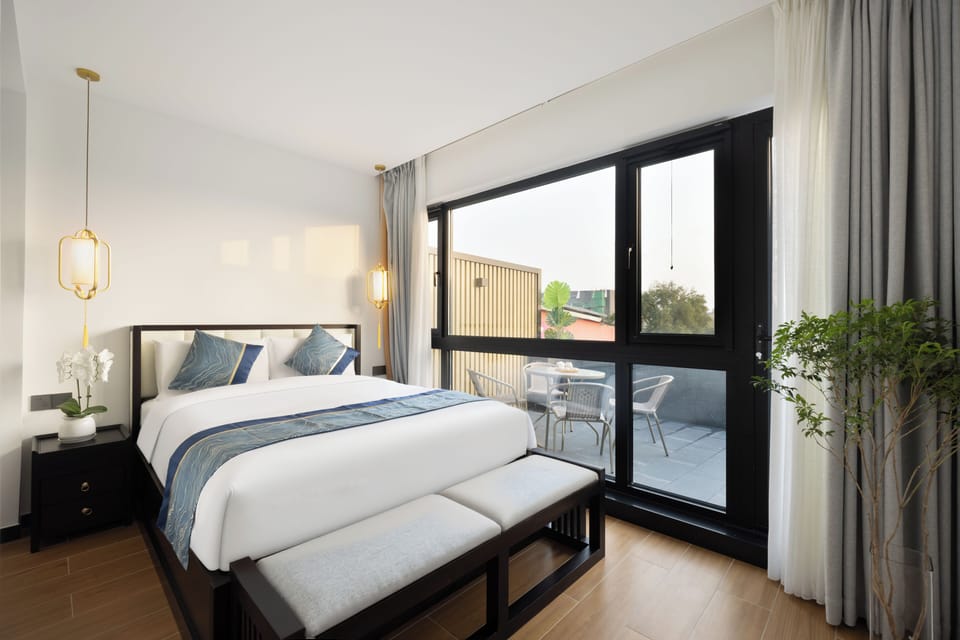 Hutong View Two Double Beds Quadruple Room with Balcony | Premium bedding, memory foam beds, desk, blackout drapes
