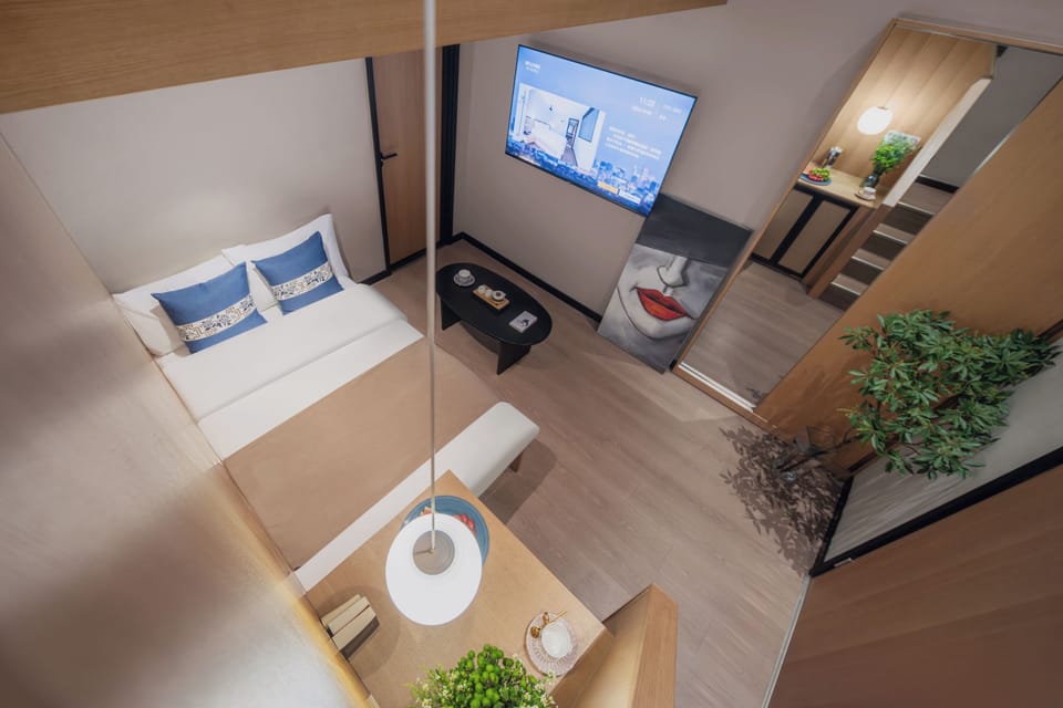 Loft Family Triple Room with One King Bed and One Single Bed | Premium bedding, memory foam beds, desk, blackout drapes