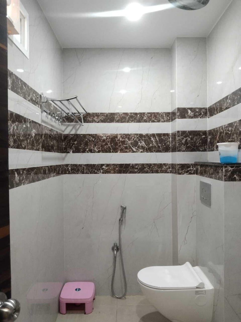 Shower, free toiletries, towels, soap