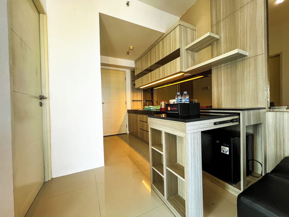 Apartment | Private kitchen | Mini-fridge, stovetop, rice cooker, dining tables