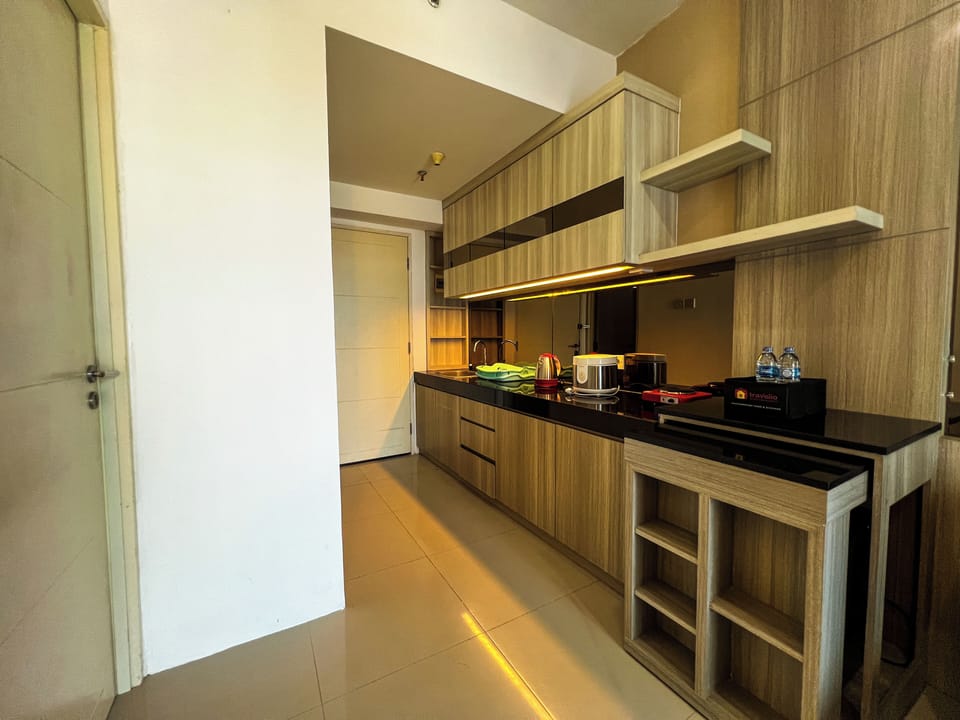 Apartment | Private kitchen | Mini-fridge, stovetop, rice cooker, dining tables