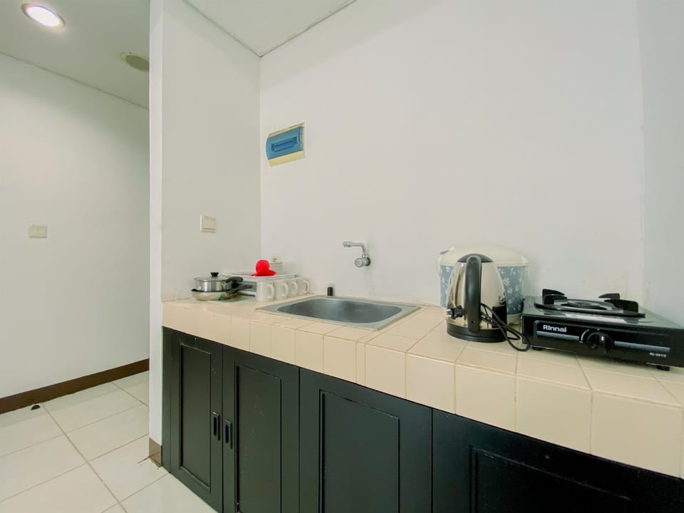 Apartment | Private kitchen | Fridge, stovetop, rice cooker, dining tables