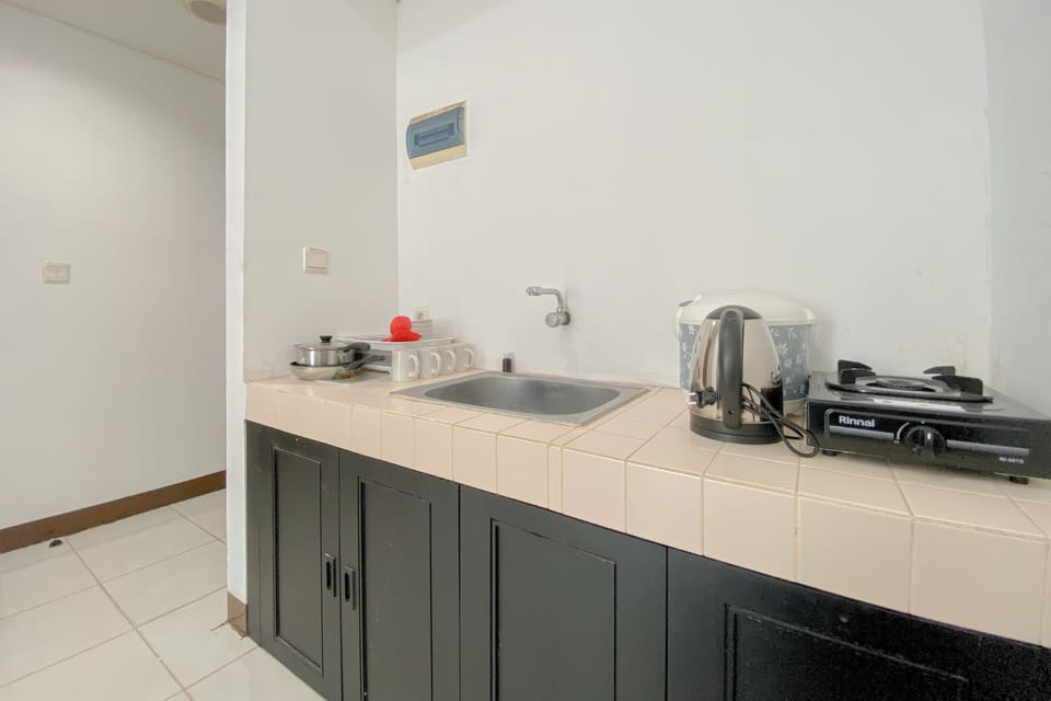 Apartment | Private kitchen | Fridge, stovetop, rice cooker, dining tables