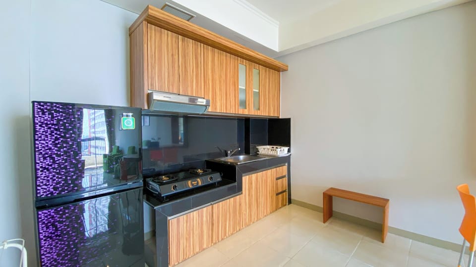 Apartment | Private kitchen | Fridge, stovetop, rice cooker, dining tables