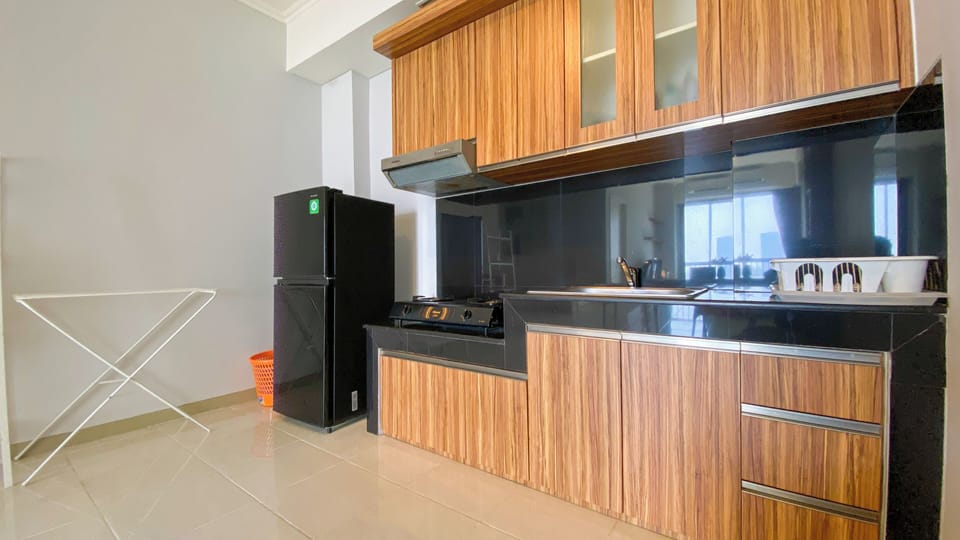 Apartment | Private kitchen | Fridge, stovetop, rice cooker, dining tables
