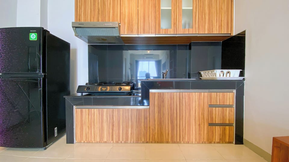 Apartment | Private kitchen | Fridge, stovetop, rice cooker, dining tables