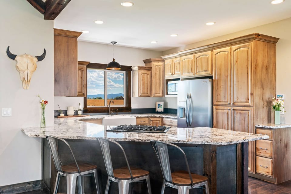 The counter and comfortable bar stools are great for meals and socializing.