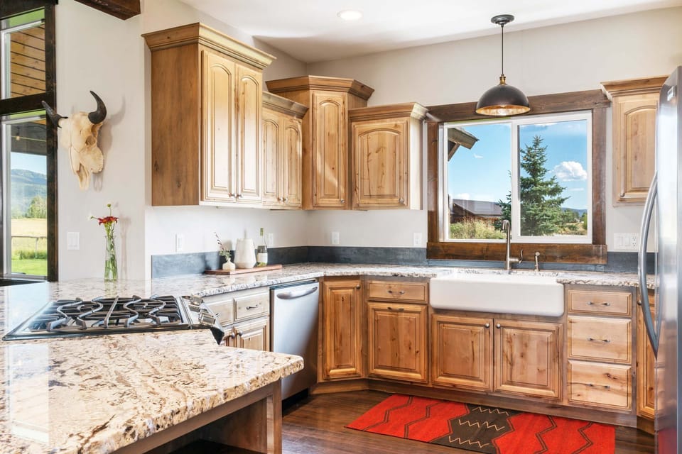 The large kitchen is equipped with everything you'd expect at home (and maybe a little more). 