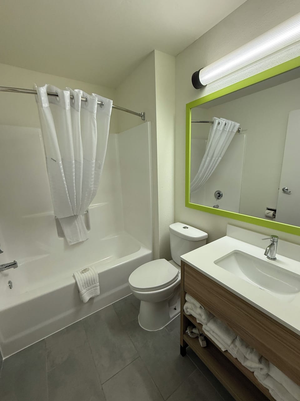 Bathtub, hair dryer, towels, soap